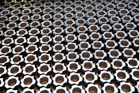 Machine parts. Axles on a factory stackの写真素材