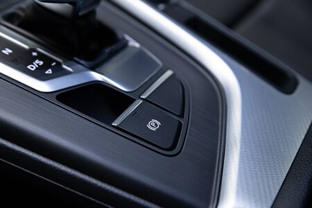 Parking brake. Electric handbrake switch. Modern car interior.の写真素材