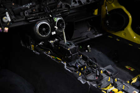 Car factory. Car without interior elements. Car under montage.の写真素材