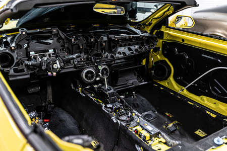 Car factory. Car without interior elements. Car under montage.の写真素材