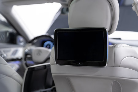 Modern luxury car interior with empty touchscreen monitor with copy space.の写真素材
