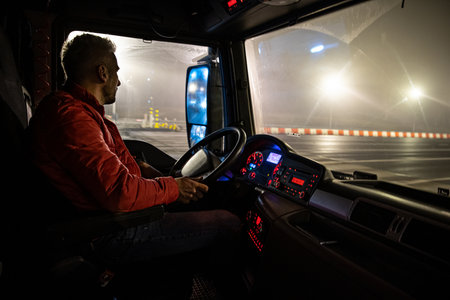 The driver at the wheel of the truck.の写真素材