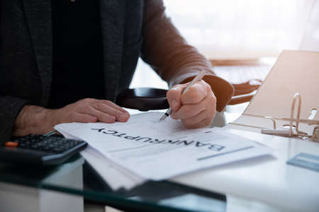 Signing documents and bankruptcy petitions by the companys president.の写真素材