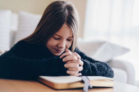 Happyness girl pray for god blessing to wishing have a better life.