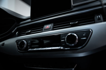 Ventilation grilles and air conditioning control panel in a modern carの写真素材
