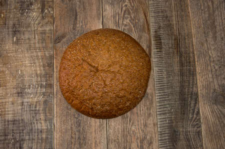 round bread on the wood table top view