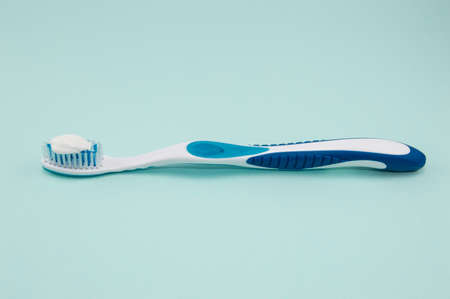 Toothbrush on a blue background