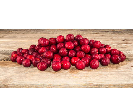 Many berries of fresh cherries on the tableの写真素材