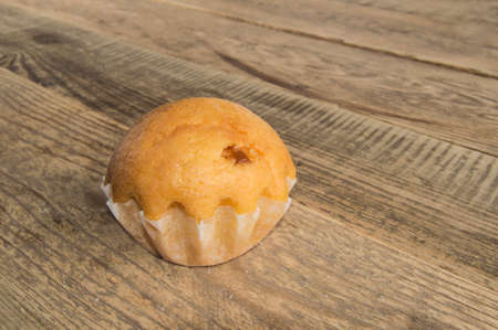 small cake on wood tableの写真素材