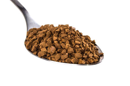 spoon with coffee on isolated white backgroundの写真素材