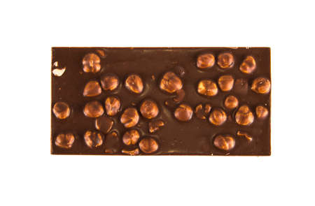 chocolate bar with hazelnuts on isolated white background