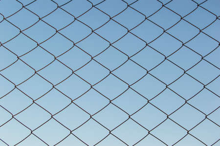 fence mesh against the sky