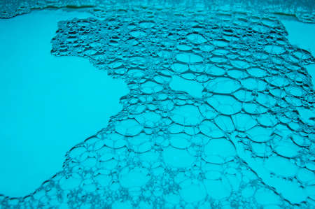 soap bubbles, blue foam background