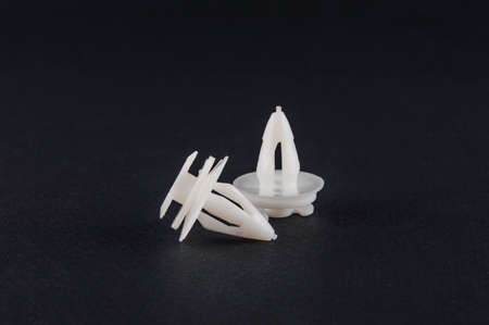 plastic clips for cars on a black background