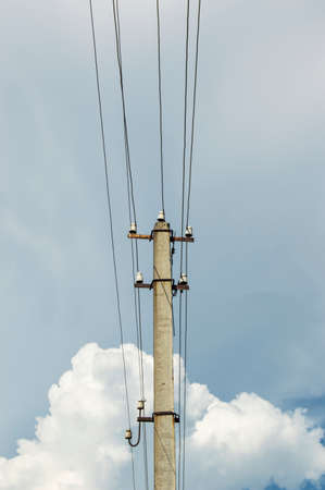 pole and wires on the sky background