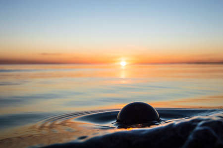 glass ball on the beach