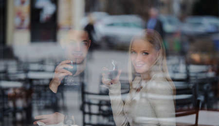 Young couple in cafeの写真素材