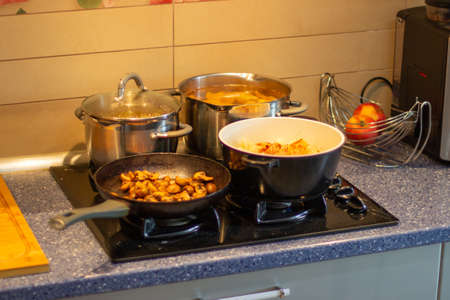 Kitchen with pots on the gas stove. Cooking dinner for familyの写真素材