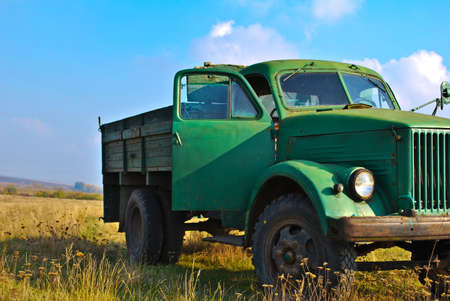  old car on the grassの写真素材