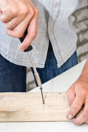 Man with screwdriver