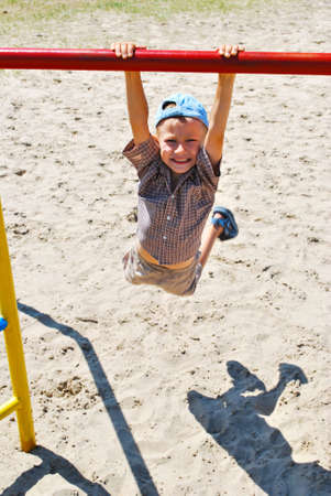 Young boy on playstructure の写真素材