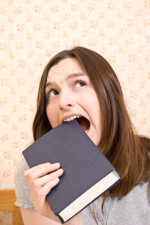  Young attractive woman with bookの写真素材