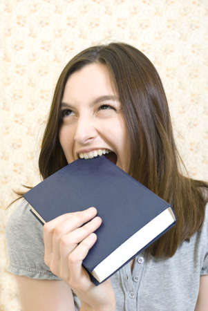 Young attractive woman with bookの写真素材