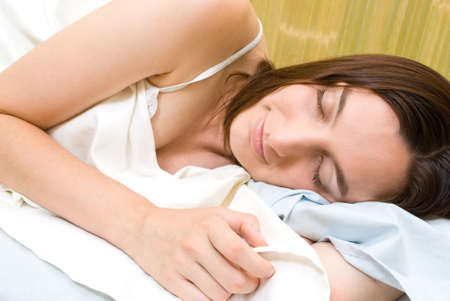 Beautiful young woman sleepingの写真素材