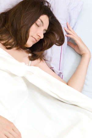 Beautiful young woman sleepingの写真素材