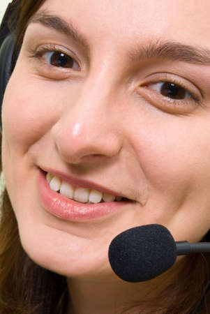Close-up face of smiling woman in headphonesの写真素材