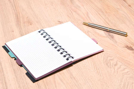  Opened notebook and the penの写真素材