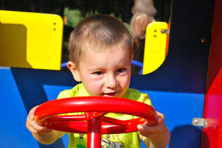  boy play on playgroundの写真素材