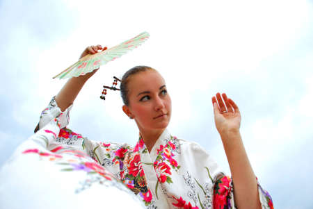 caucasian model dressed up in traditional japanese clothingの写真素材