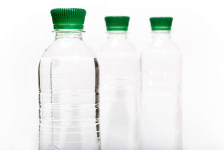 Plastic bottles of mineral water isolated on the  white backgroundの写真素材
