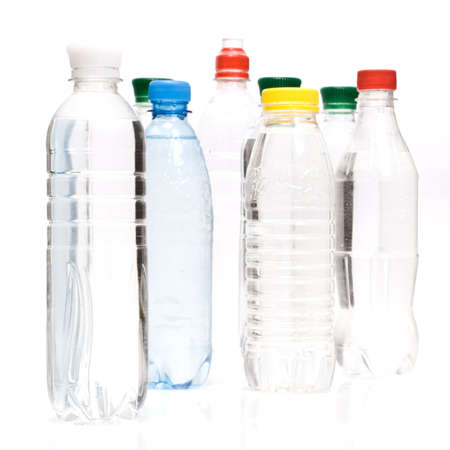 Plastic bottles of mineral water isolated on white backgroundの写真素材