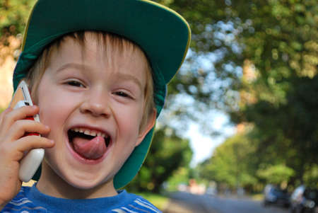   Baby Boy Speaking By Phoneの写真素材