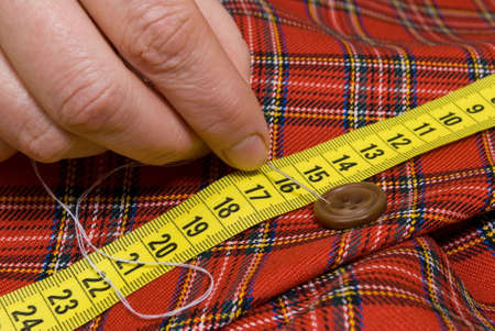 Needle and sewing buttonの写真素材