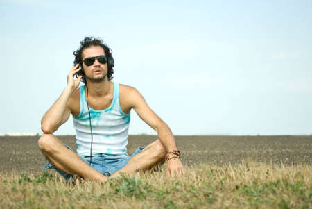 Portrait of young man with headphonesの写真素材