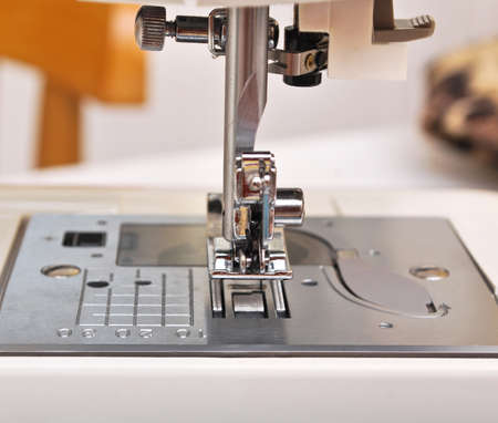 Hand sewing on a machineの写真素材