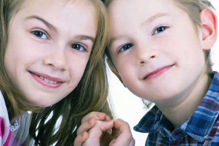 Lovely sweet kids. On white backgroundの写真素材