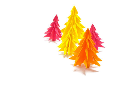 Christmas trees made of paper on white background