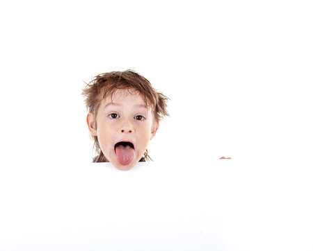 Boy holding a banner isolated on white backgroundの写真素材