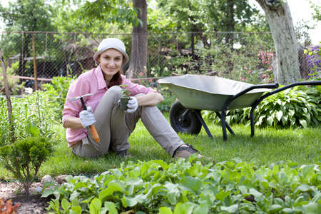 Portrait of woman in the gardenの写真素材