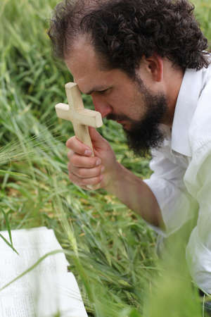 Man praying for good wheat year