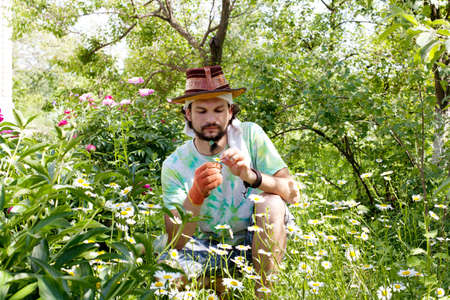 Man  in the beautiful gardenの写真素材