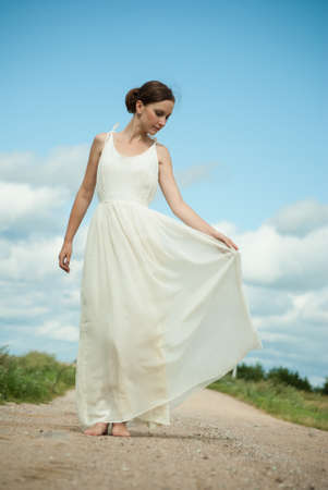 Young woman in the fieldの写真素材