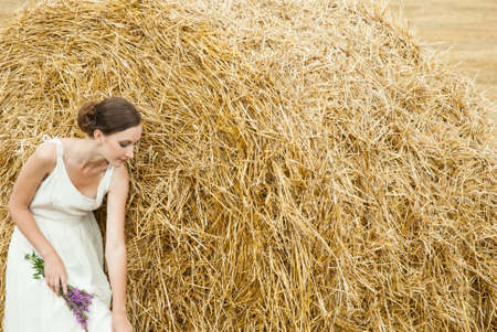 Young woman in the fieldの写真素材