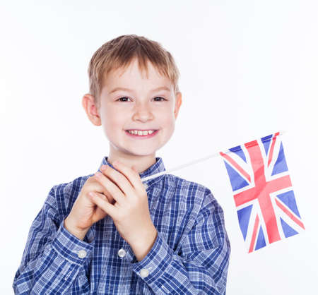 A little boy with english flag on the white backgroundの写真素材