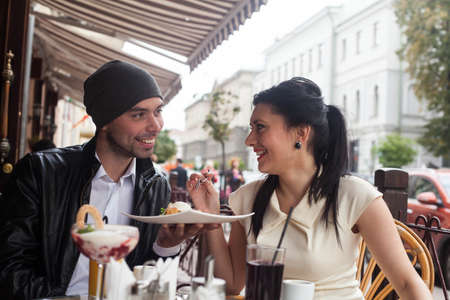 Happy Beautiful couple relaxing on the open airの写真素材