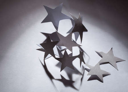 Paper christmas stars on the white background .の写真素材
